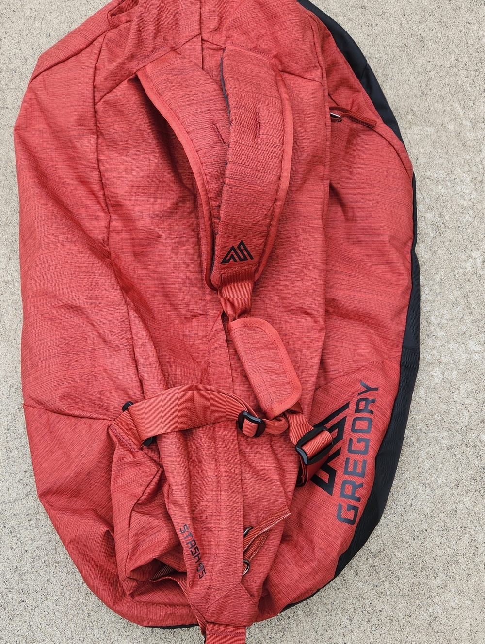 Gregory Red Stash 95 Travel Duffel with Black Accents